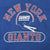 Close-up of New York Giants helmet graphic and red-and-white lettering on blue shirt