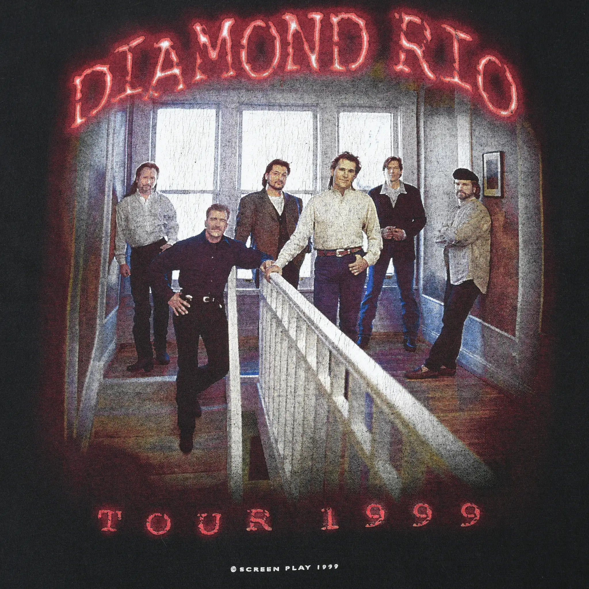 Close-up of Diamond Rio band portrait and Tour 1999 front print
