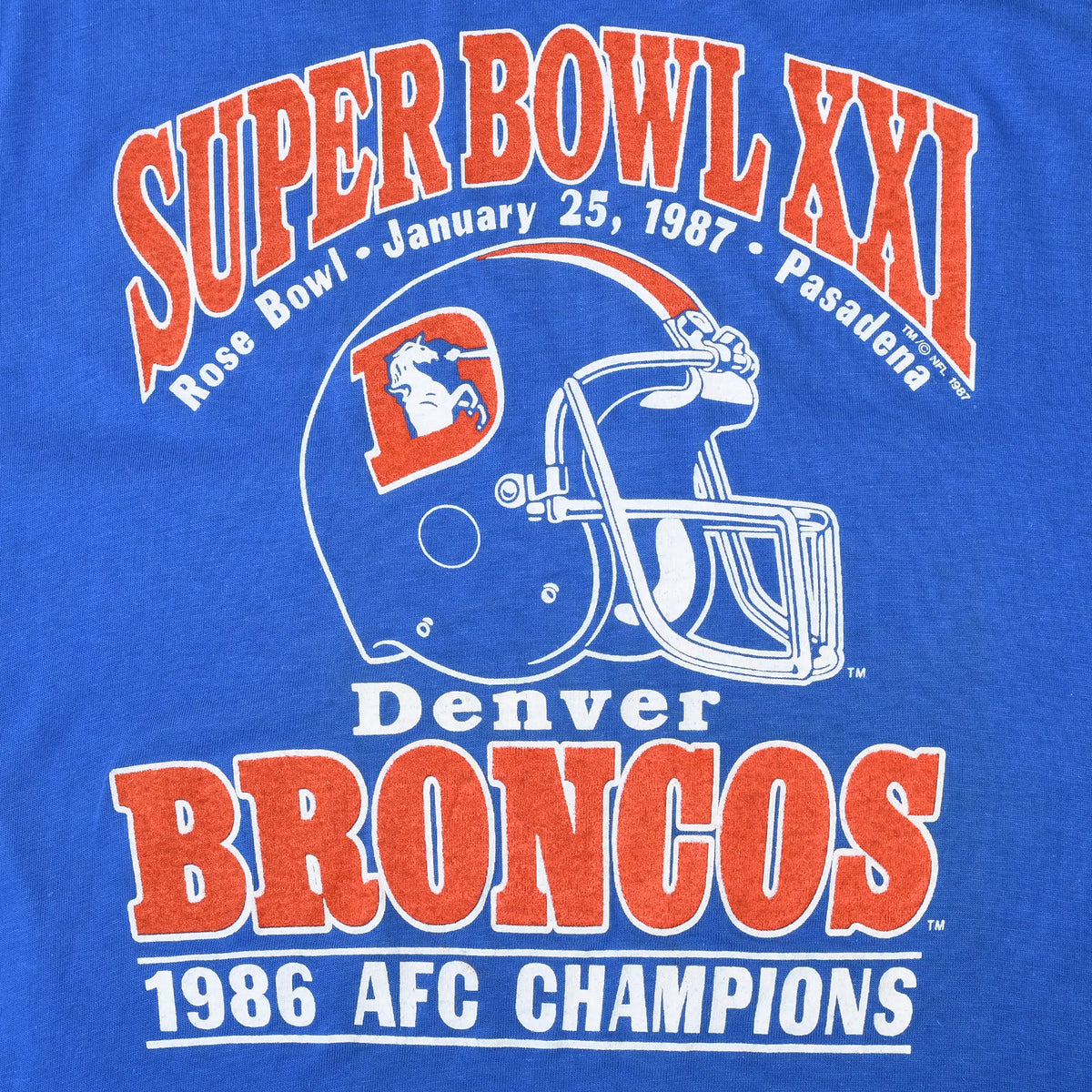 Close-up of Denver Broncos Super Bowl XXI helmet and 1986 AFC Champions graphic