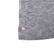 Close-up of gray T-shirt lower hem with arrow marking a small fabric spot