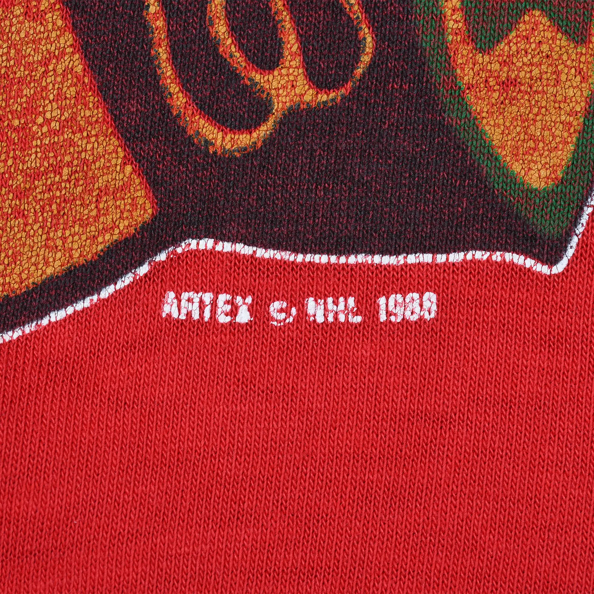 Close-up of 1988 NHL copyright text beneath the Blackhawks graphic