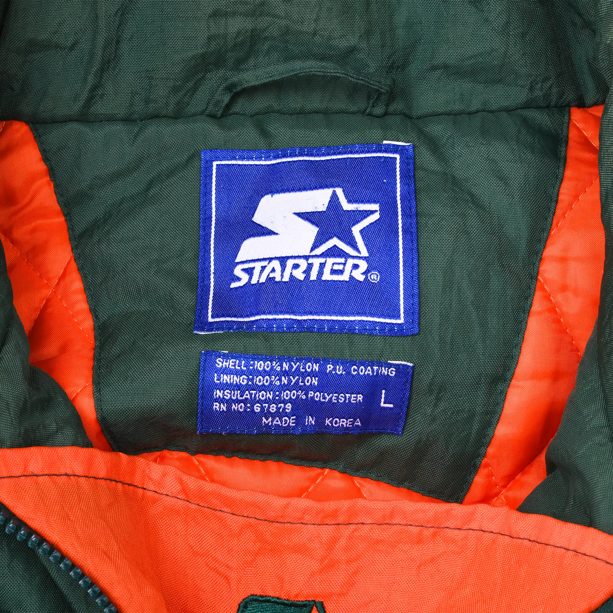 Starter brand and large size labels inside Miami Hurricanes jacket
