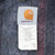 Close-up of Carhartt interior logo and care label showing C02MOS model code