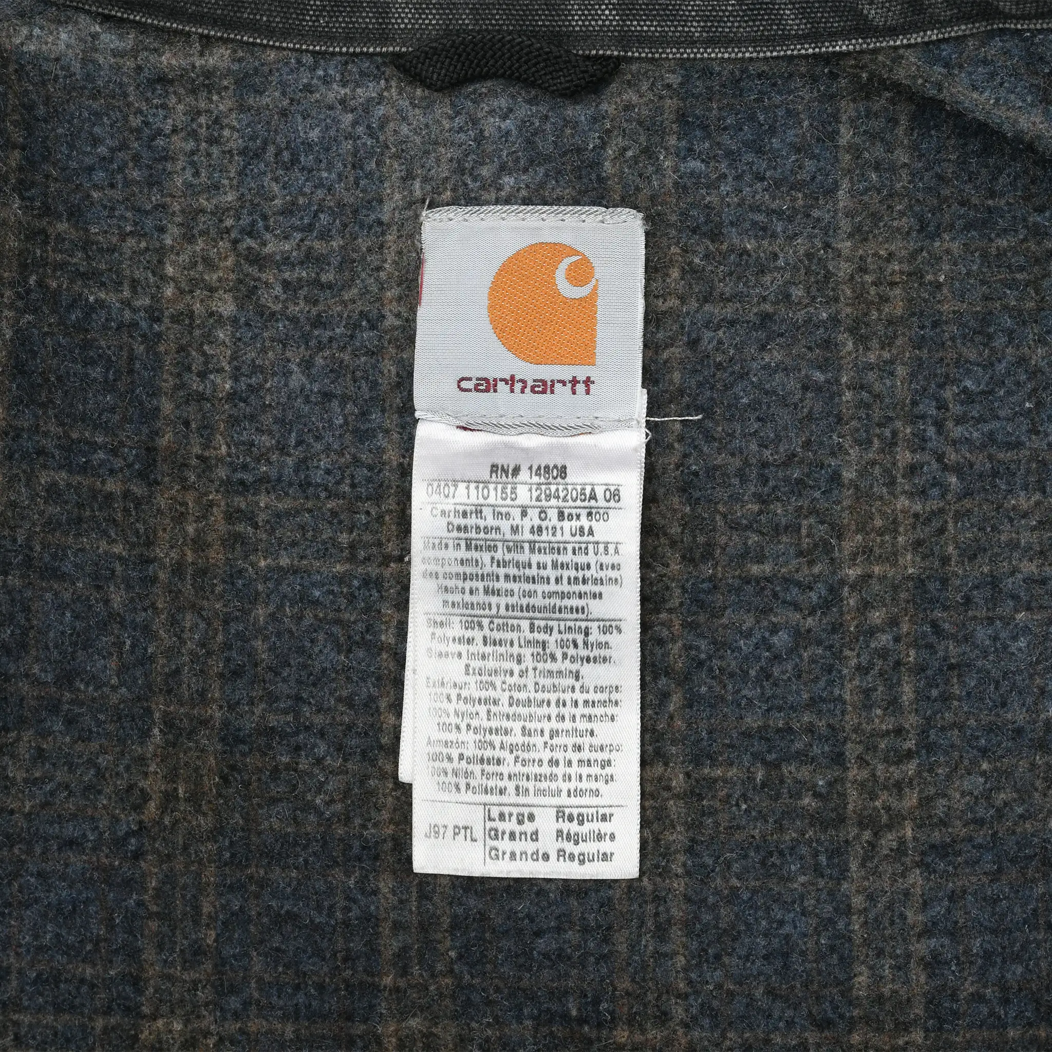 Close-up of Carhartt interior label marked J97 PTL and Large