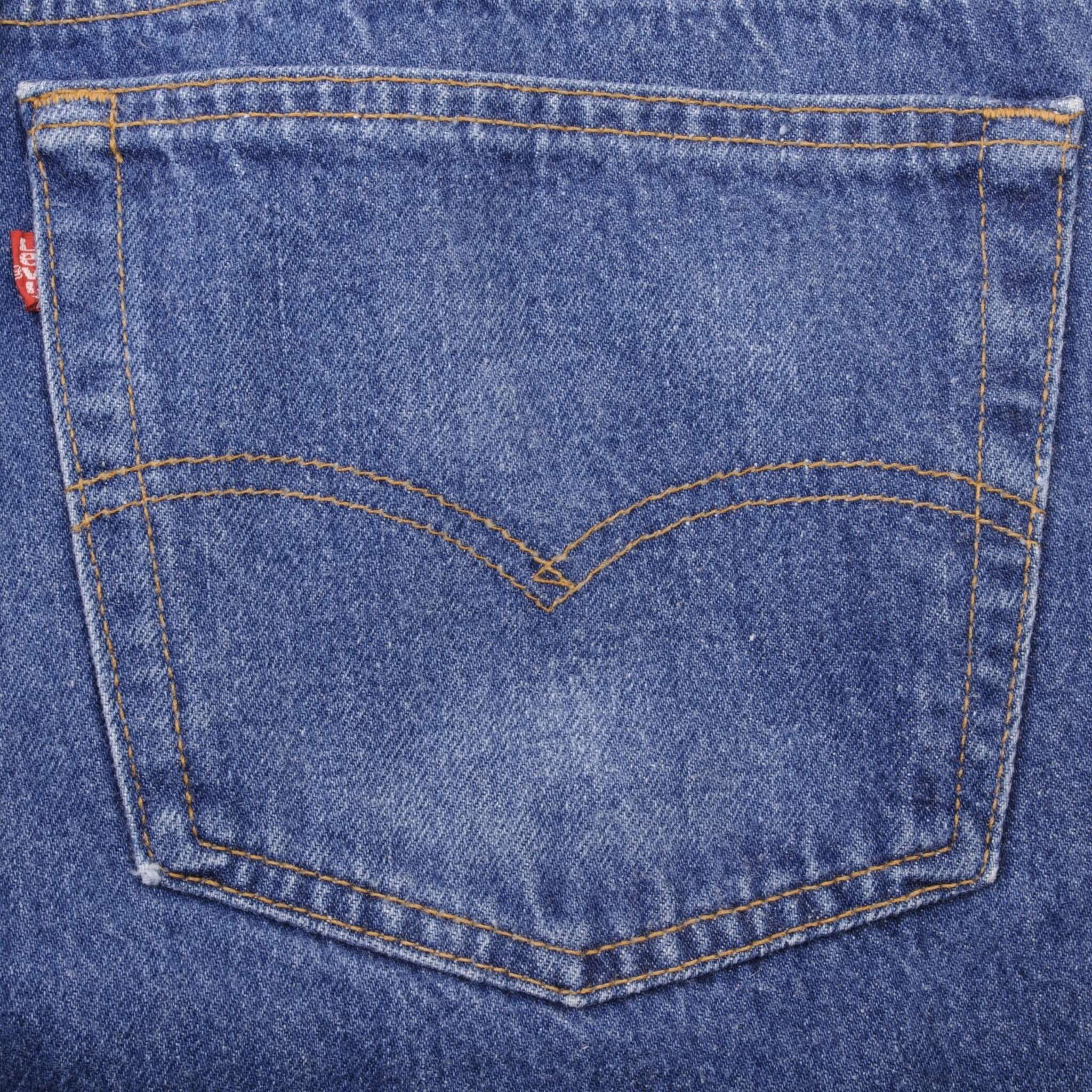 Beautiful Indigo Levis 501 Jeans 1980s Made in USA with Medium Wash with light Whiskers  Size on tag 38X36 Actual Size 36X33 Back Button #552