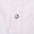 Close-up of engraved silver-tone Levi's snap on white denim shirt placket