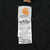 Carhartt interior brand and care labels on black quilted lining