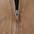 Close-up of metal front zipper on brown Carhartt jacket