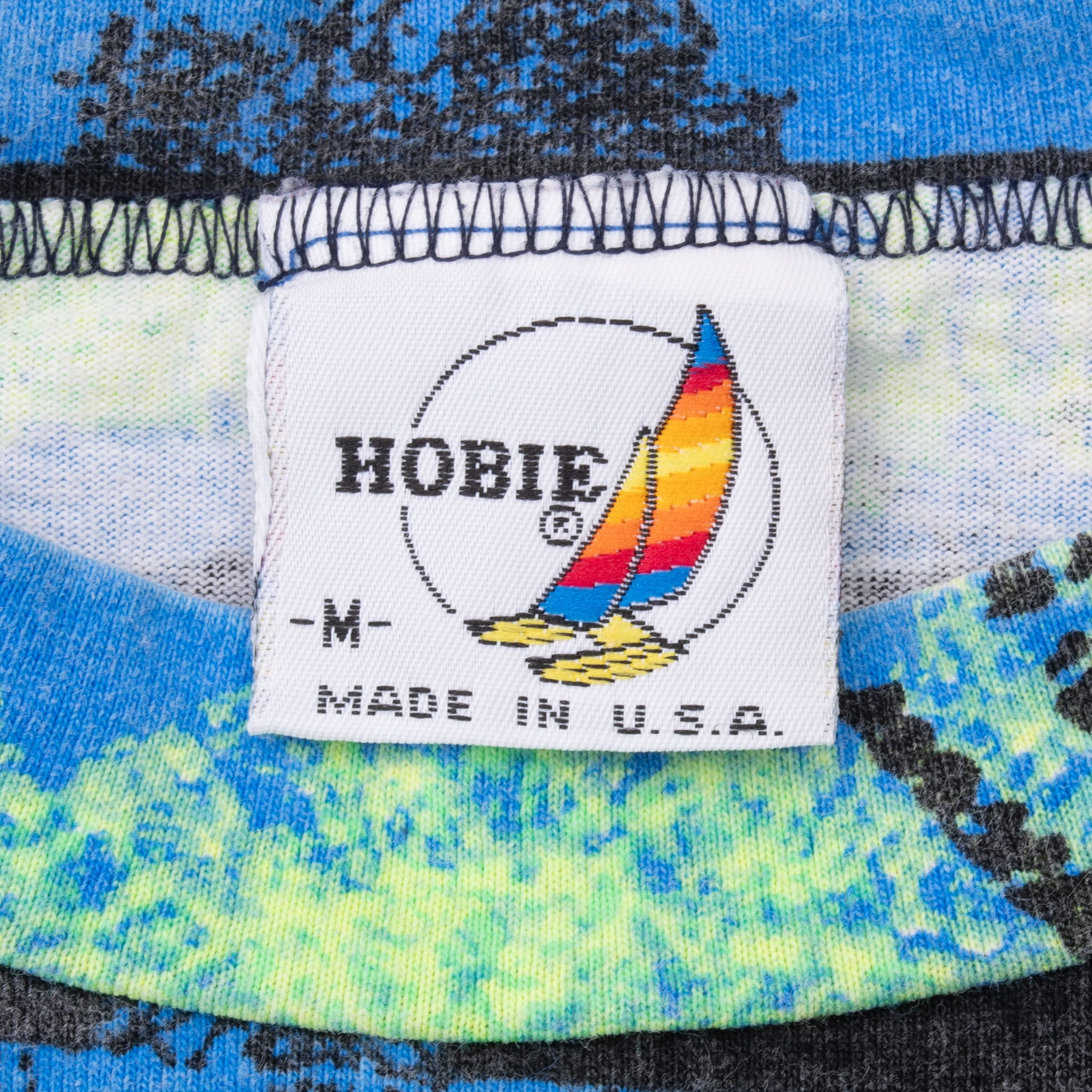 VINTAGE HOBIE ALL OVER PRINT SURF TEE SHIRT 1990S MEDIUM MADE IN USA