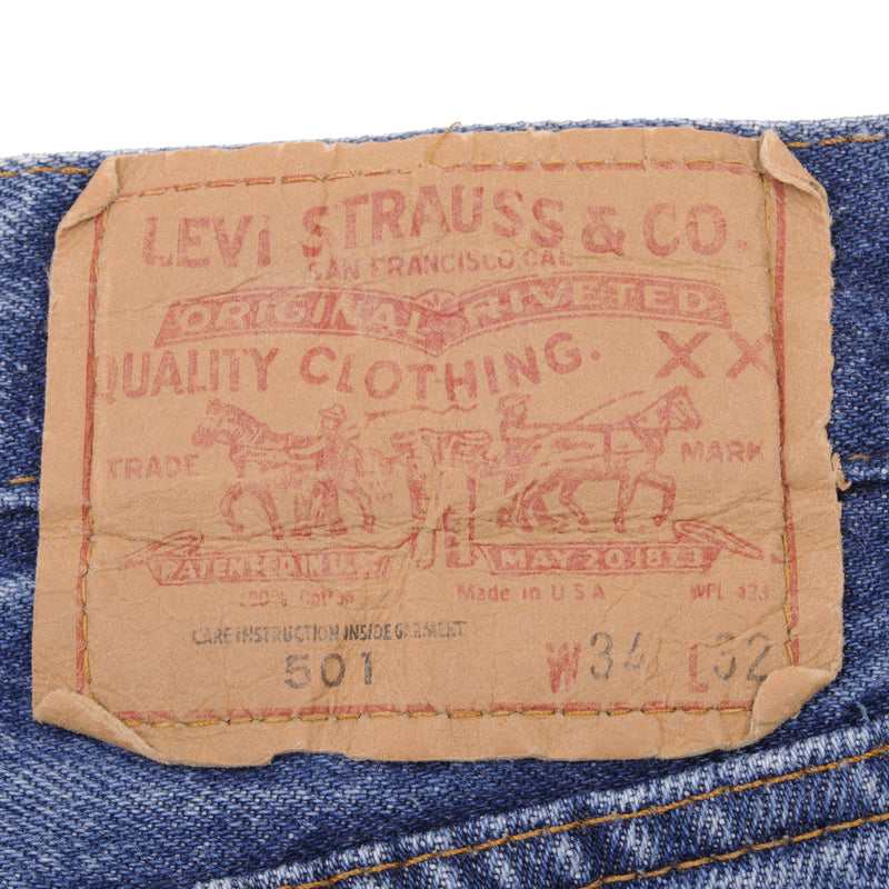 Beautiful Indigo Levis 501 Jeans 1980s Made in USA with Medium Wash With Blue Bar Tacks  Size on tag 34X32 Actual Size 33X30  Back Button #558
