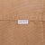 Close-up of Carhartt brand tab stitched to brown vest exterior
