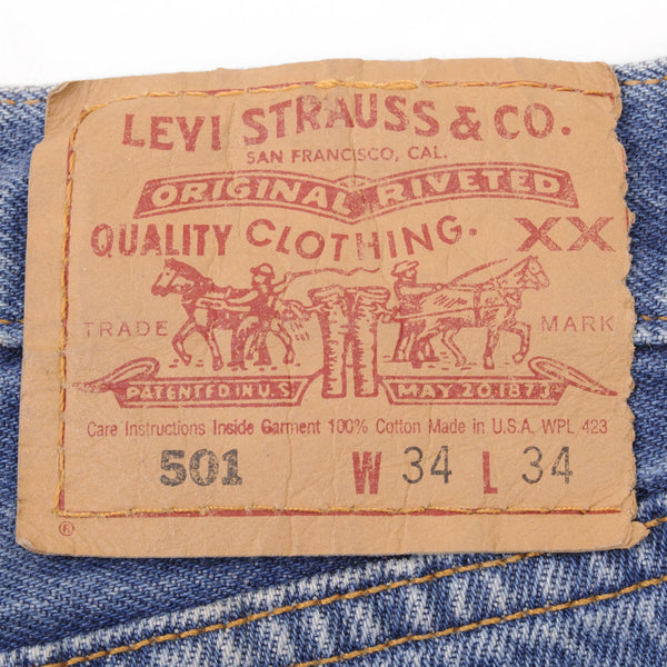 Beautiful Indigo Levis 501 Jeans 1980s Made in USA with Medium Wash   Size on tag 34X34 Actual Size 34X34 Back Button #524