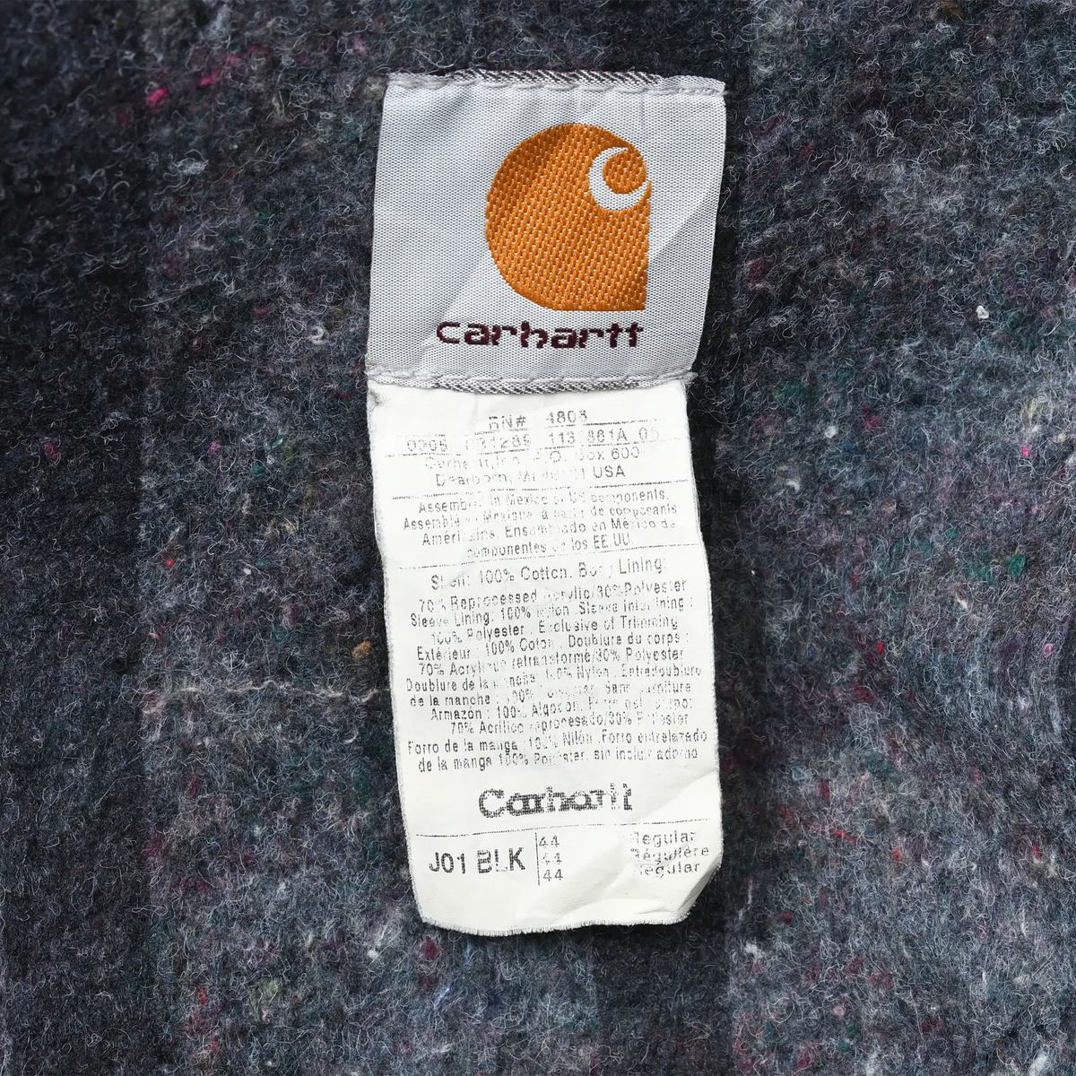 Carhartt interior label on blanket lining showing style J01 BLK and size 44