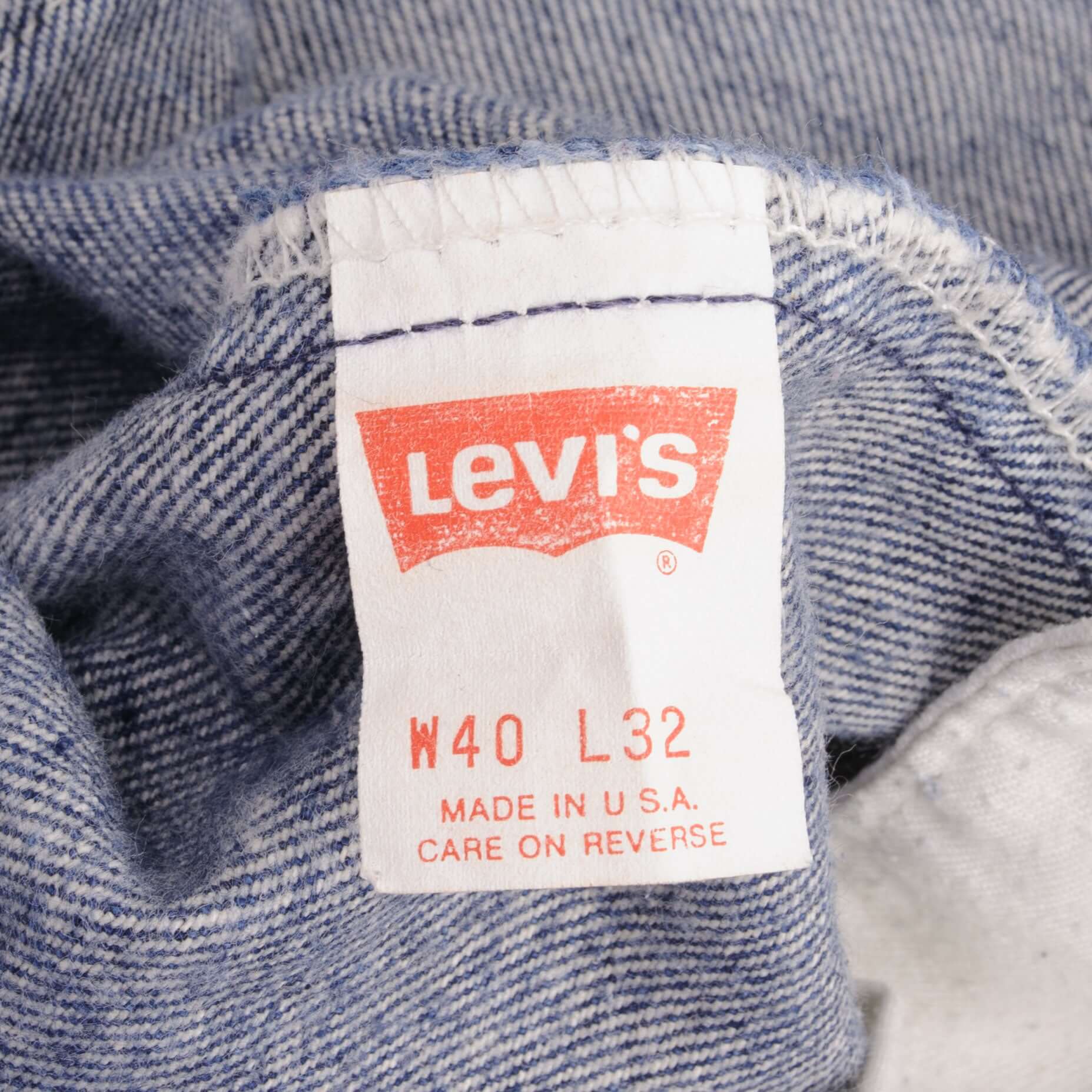 Beautiful Indigo Levis 505 Jeans Made in USA with Medium Dark wash, Not Original Hem  Size on Tag 40X32  Actual Size 40X30.5  Back Button #532