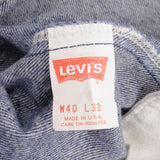Beautiful Indigo Levis 505 Jeans Made in USA with Medium Dark wash, Not Original Hem  Size on Tag 40X32  Actual Size 40X30.5  Back Button #532