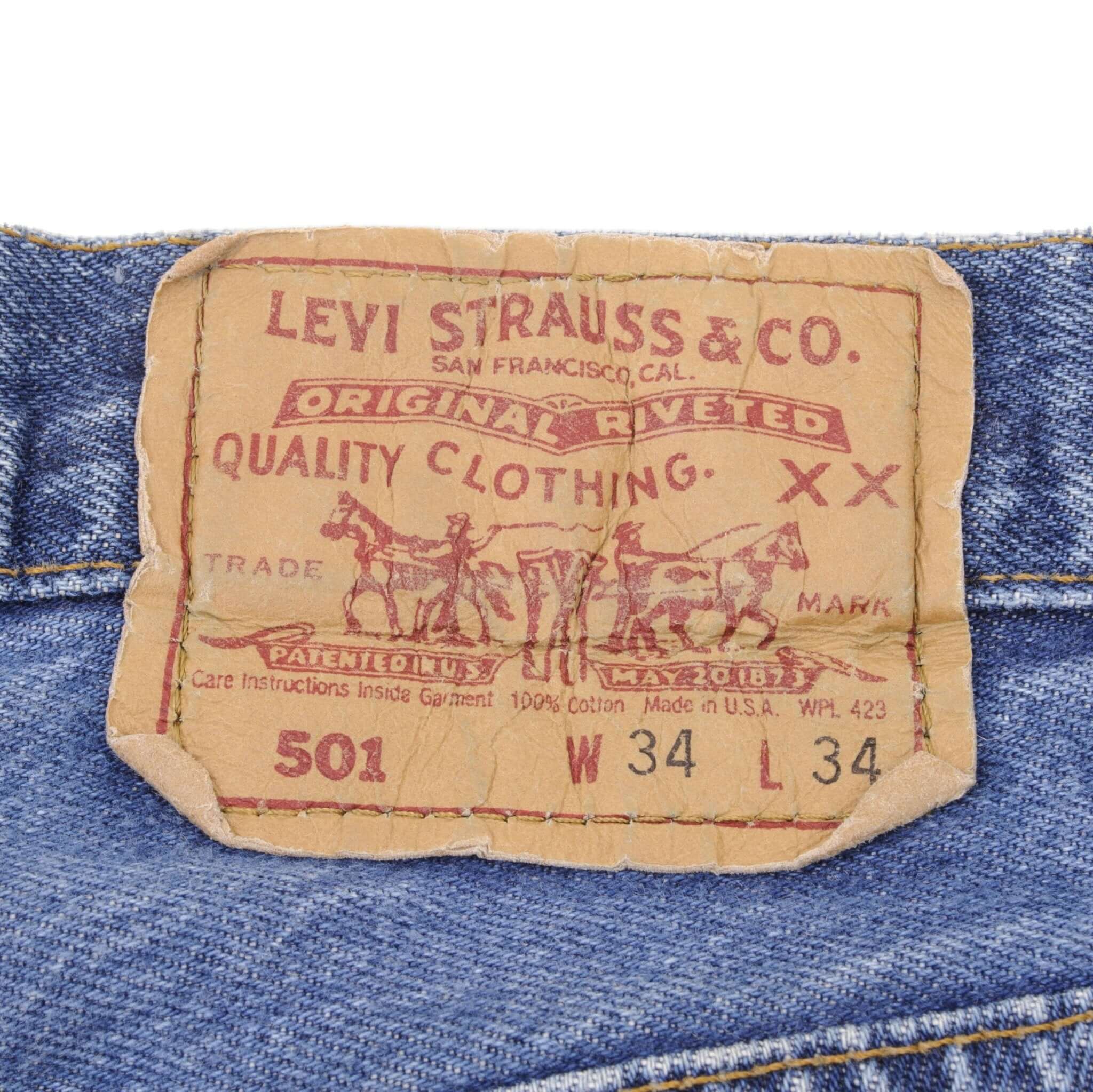 Beautiful Indigo Levis 501 Jeans 1980s Made in USA with Medium Wash   Size on tag 34X34 Actual Size 34X34  Back Button #520