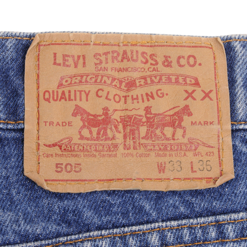 Beautiful Indigo Levis 505 Jeans Made in USA with Medium wash  Size on Tag 33X36  Actual Size 32X36  Back Button #532