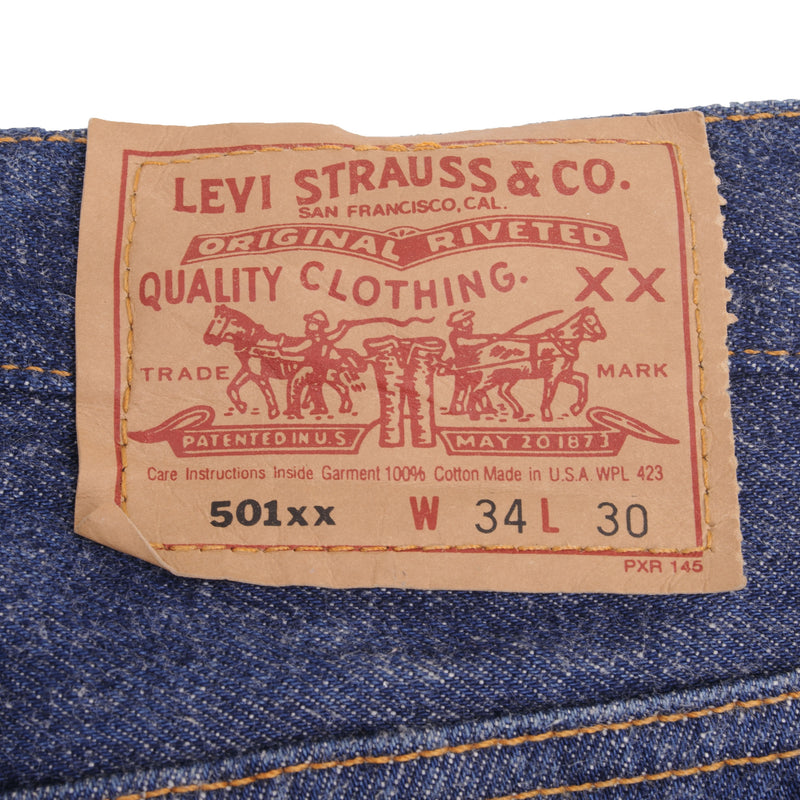 Beautiful Indigo Levis 501 Jeans Made in USA with dark wash Size on Tag 34X30 Actual Size 34X28 Back Button #544
