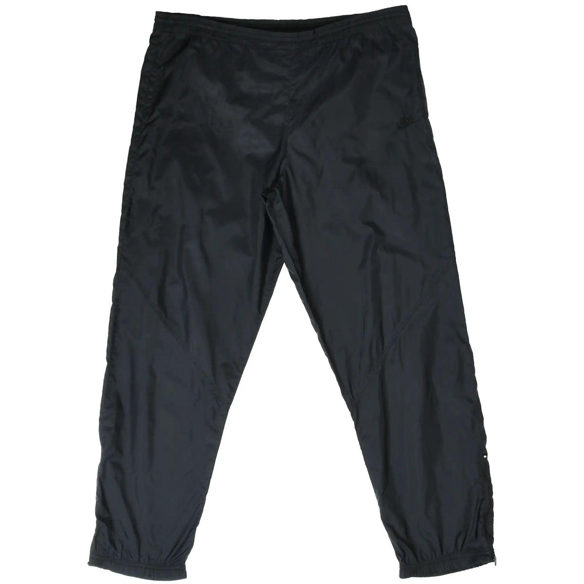 Front of black Nike women's track pants with elastic waistband and cuffs