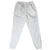 Front of white Nike track pants with elastic waist, curved knee seams, and elastic cuffs