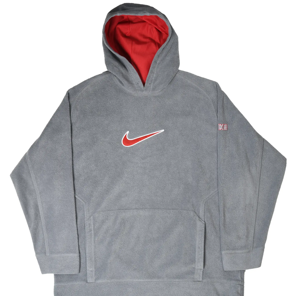 Front of grey Nike fleece hoodie with red hood lining, embroidered Swoosh, sleeve logo, and kangaroo pocket