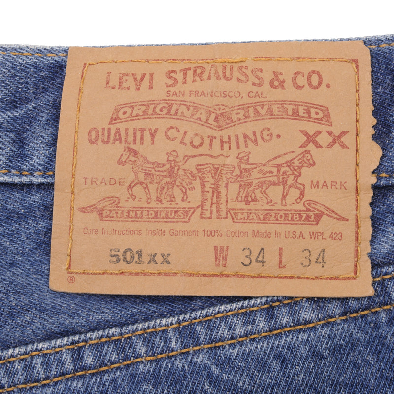 Beautiful Indigo Levis 501 Jeans 1990s Made in USA with Medium Wash   Size on tag 34X34 Actual Size 34X32 Back Button #524