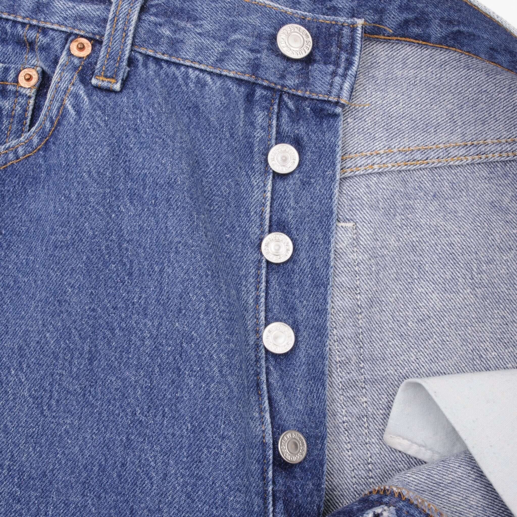 Beautiful Indigo Levis 501 Jeans 1990s Made in USA with Medium Wash   Size on tag 34X34 Actual Size 34X29 1/2 Back Button #553 Not Original Hem