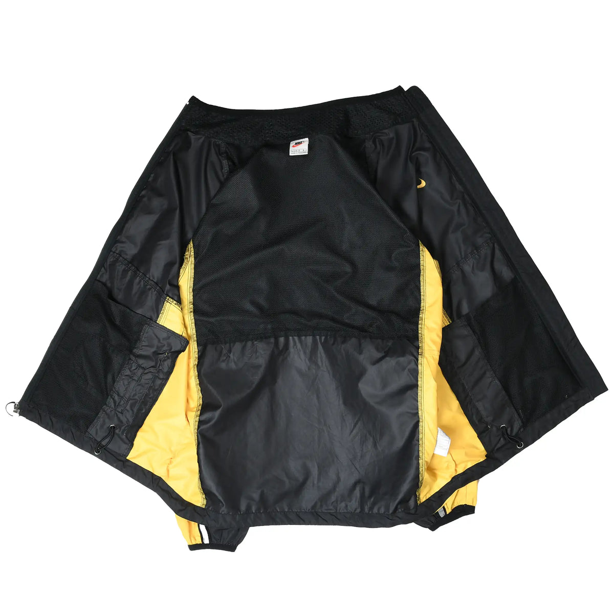 Open Nike windbreaker showing black mesh lining and yellow interior side panels
