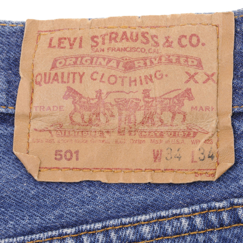 Beautiful Indigo Levis 501 Jeans 1990s Made in USA with Medium Wash   Size on tag 34X34 Actual Size 34X29 1/2 Back Button #553 Not Original Hem