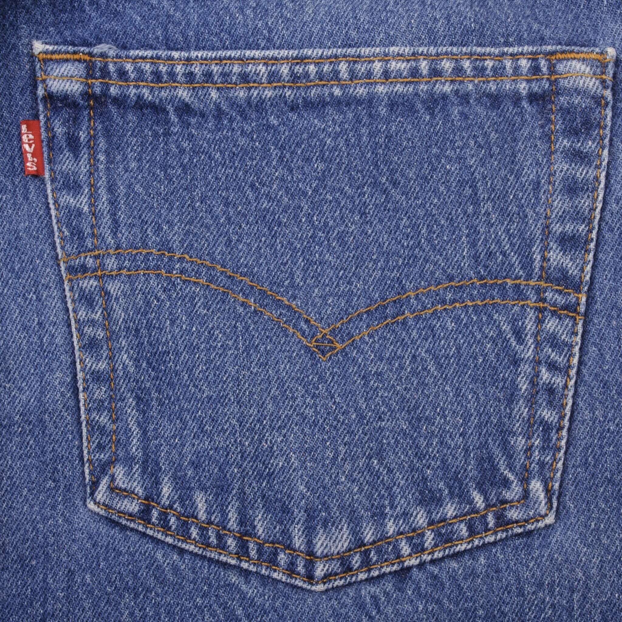Beautiful Indigo Levis 501 Jeans 1990s Made in USA with Medium Wash   Size on tag 34X34 Actual Size 34X29 1/2 Back Button #553 Not Original Hem