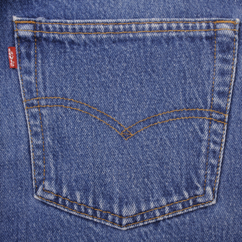 Beautiful Indigo Levis 501 Jeans 1990s Made in USA with Medium Wash   Size on tag 34X34 Actual Size 34X29 1/2 Back Button #553 Not Original Hem