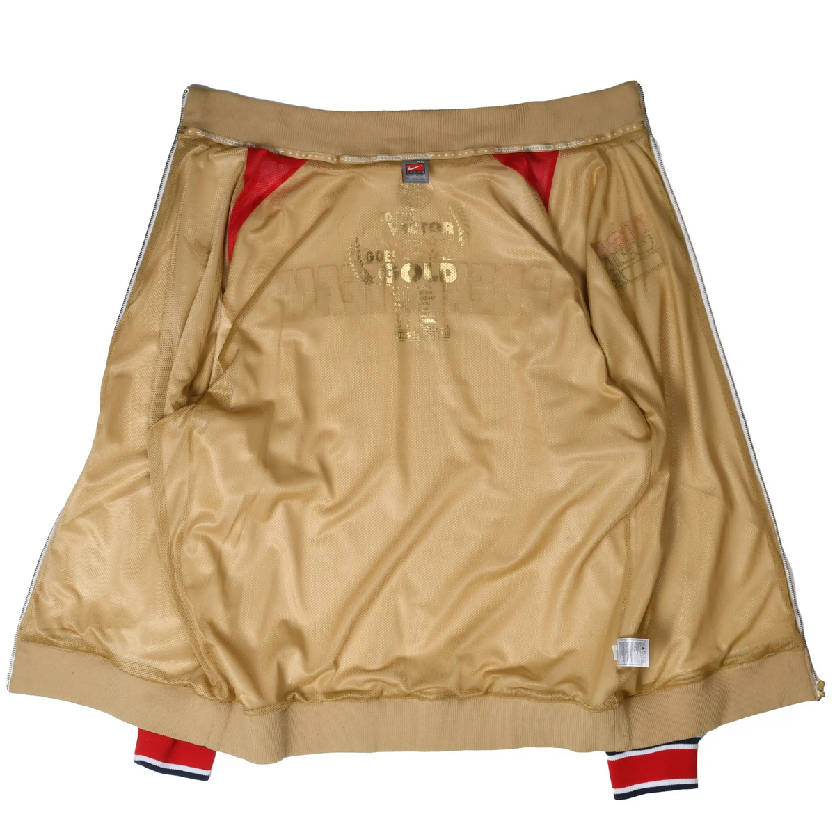 Open jacket showing gold interior lining, red shoulder panels and printed details