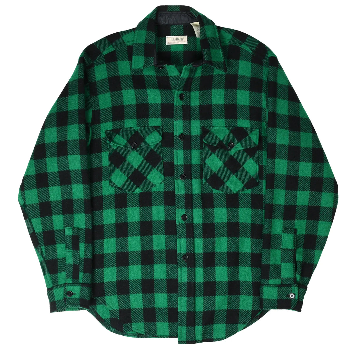 Front of green and black plaid L.L.Bean flannel shirt showing buttons, collar, and chest pockets