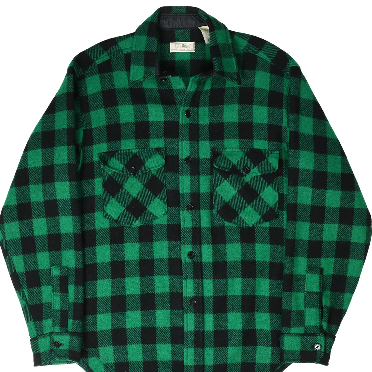 Front of L.L.Bean green and black plaid flannel shirt with two button-flap chest pockets