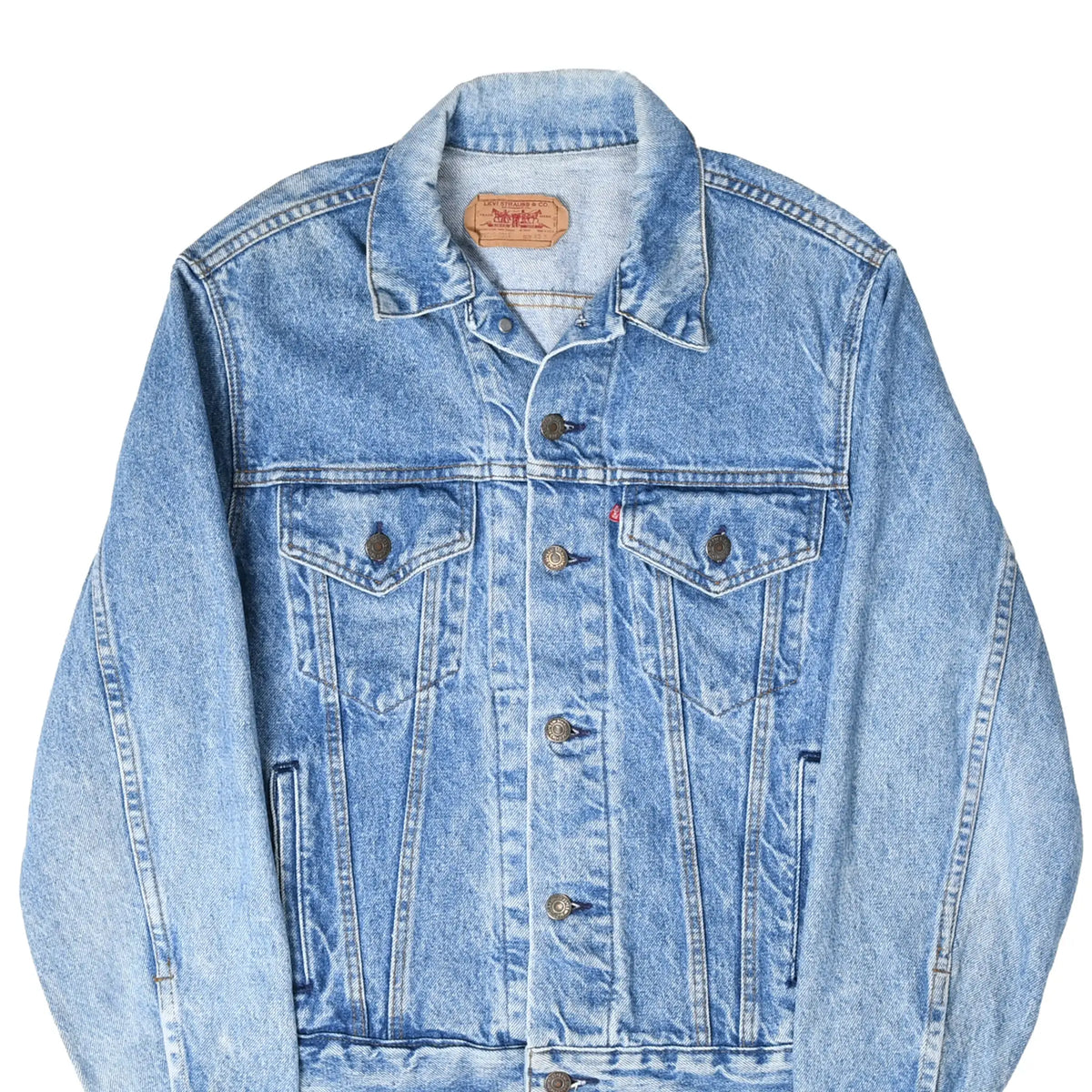 Front upper view of blue Levi's Type III denim jacket with buttoned chest pockets and hand pockets