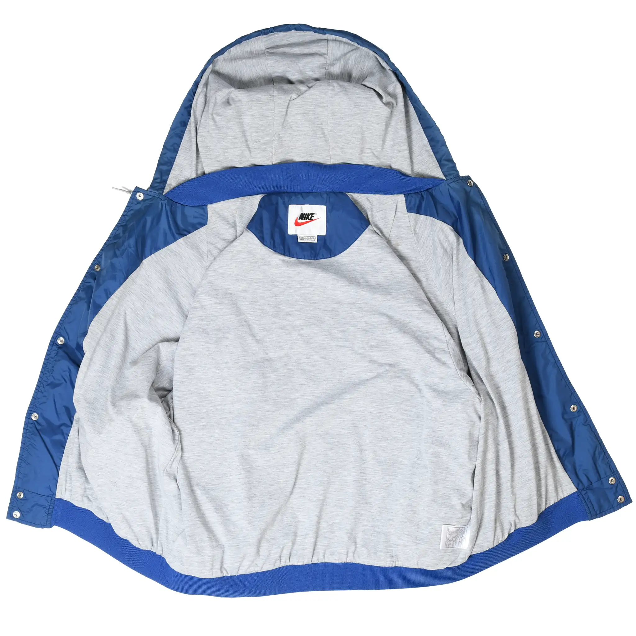 Open blue Nike hooded windbreaker showing gray interior lining and neck label