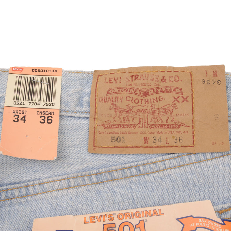 Beautiful Indigo Levis 501 Jeans 1990s Made in USA with Very Light Wash   Size on tag 34X36 Back Button #511