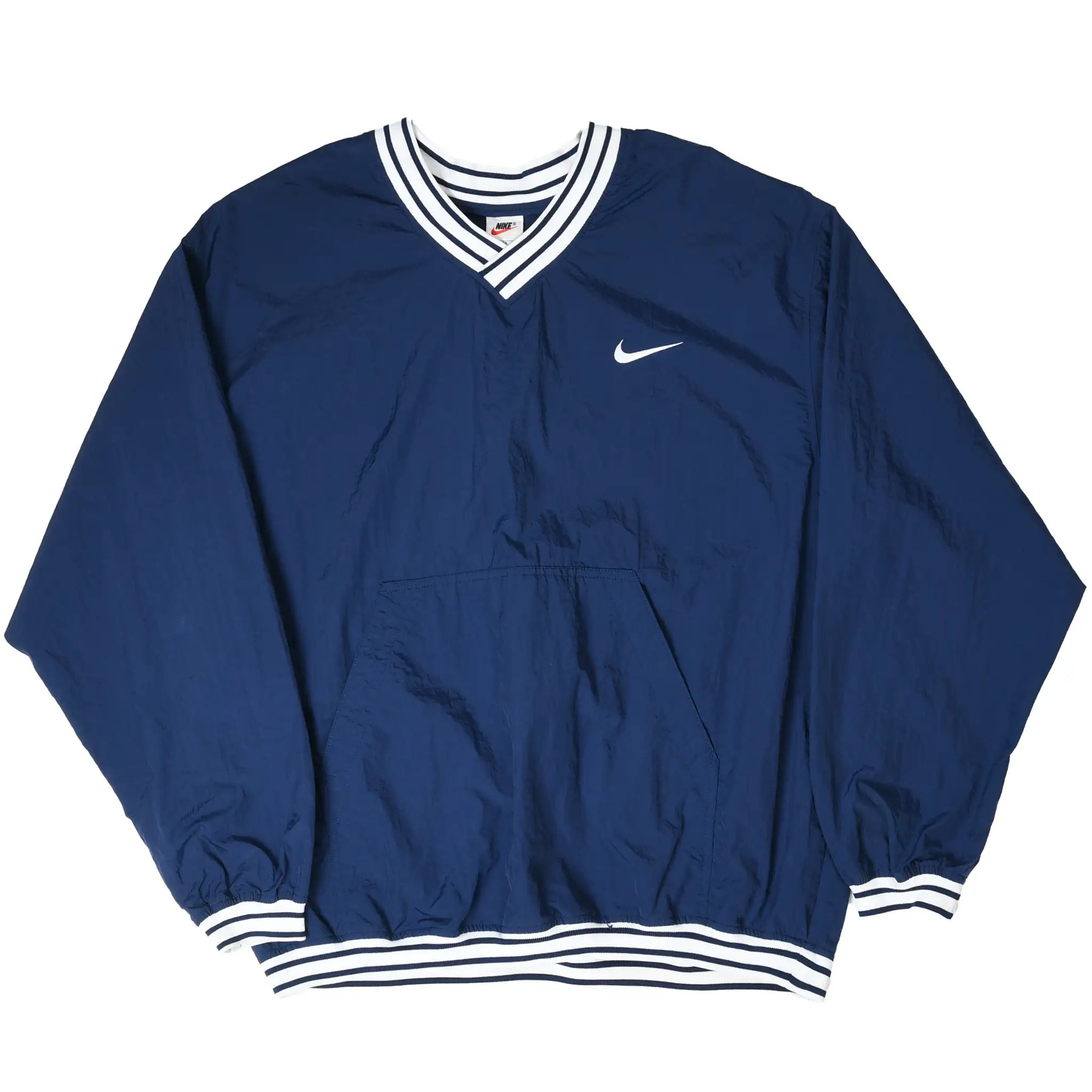 Angled front view of navy Nike pullover windbreaker with white Swoosh and striped trim