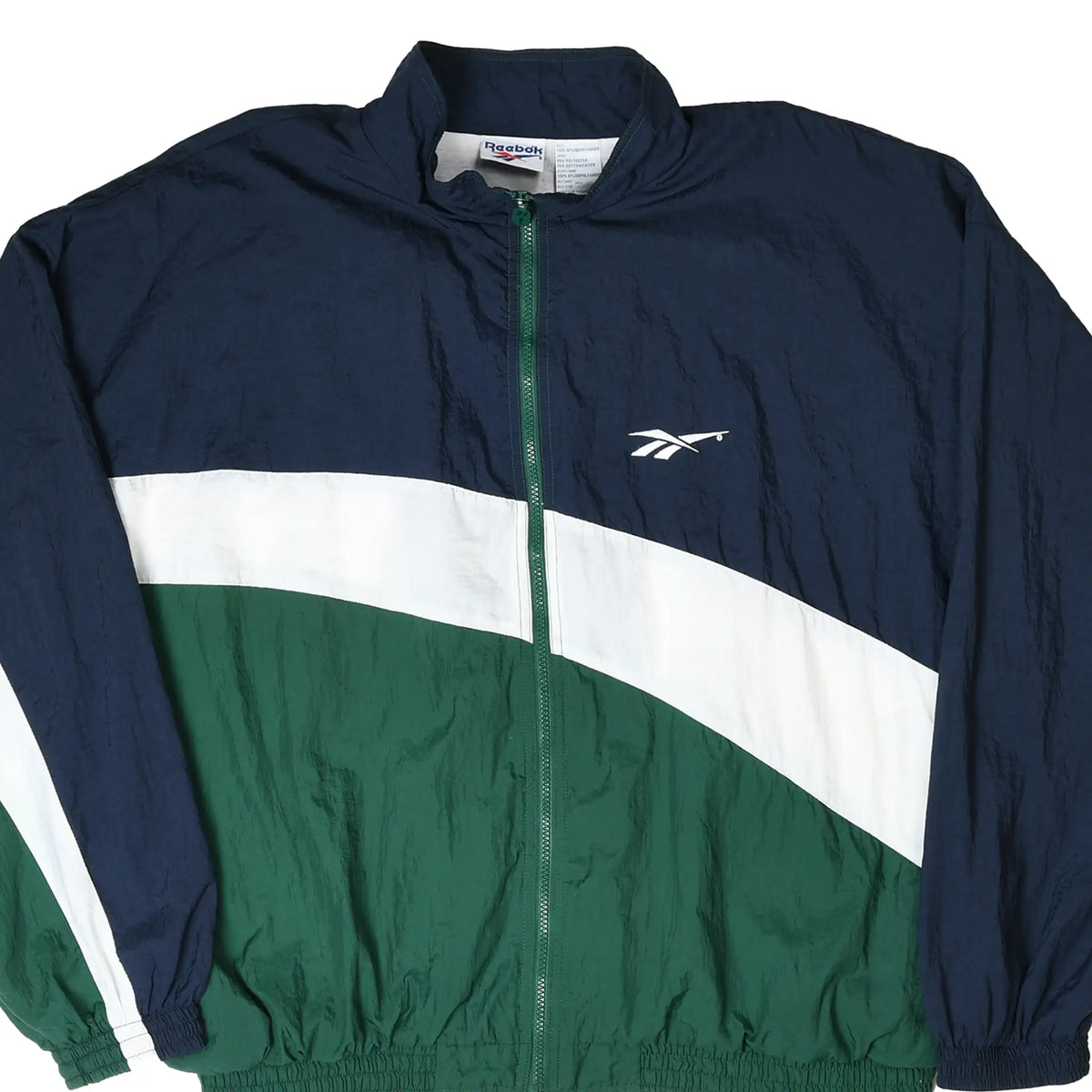 Front of Reebok windbreaker jacket in navy, white, and green with full zipper and chest logo