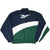 Back of navy, white, and green Reebok windbreaker jacket with large white logo