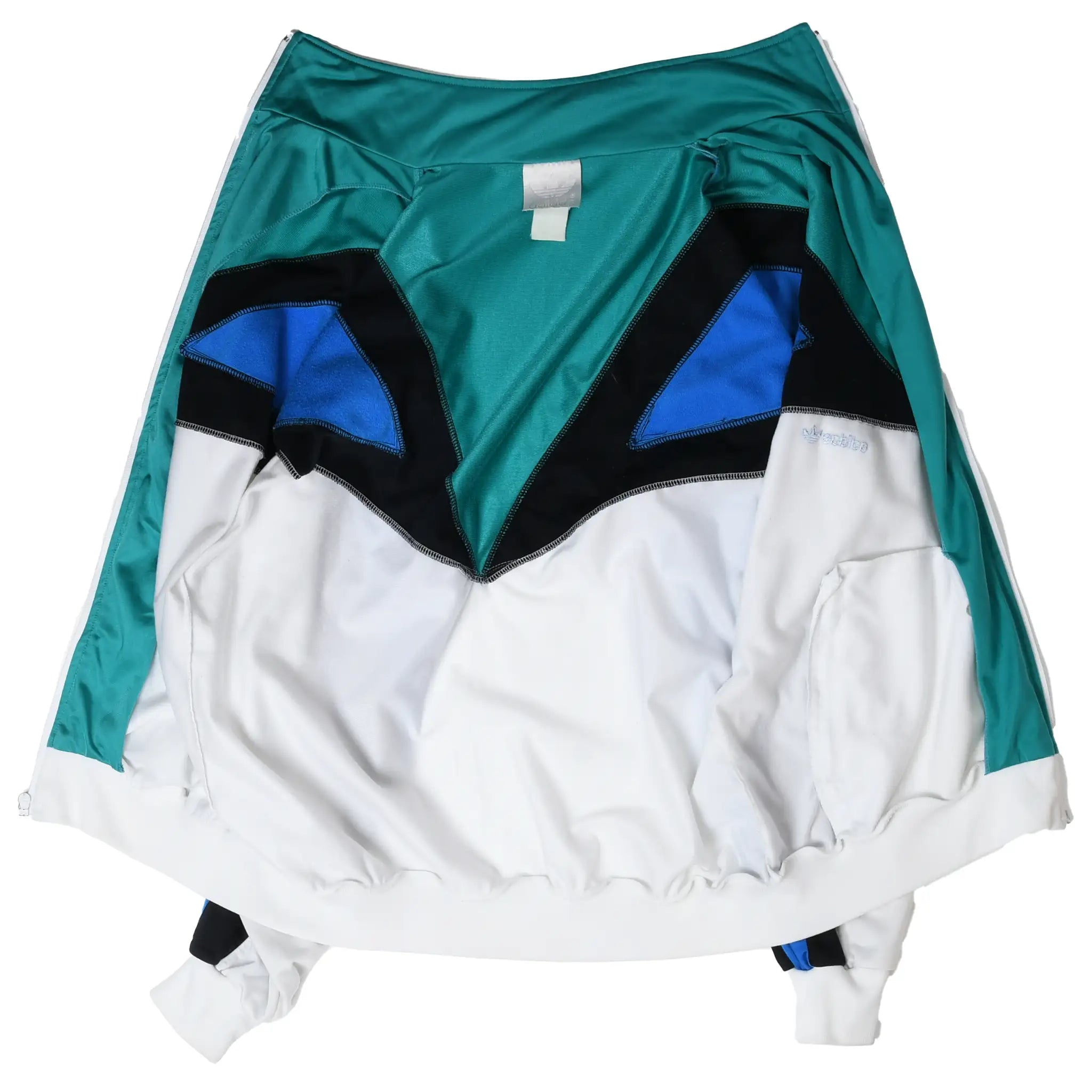 Inside view of Adidas track jacket showing color-block panels, label and interior seams