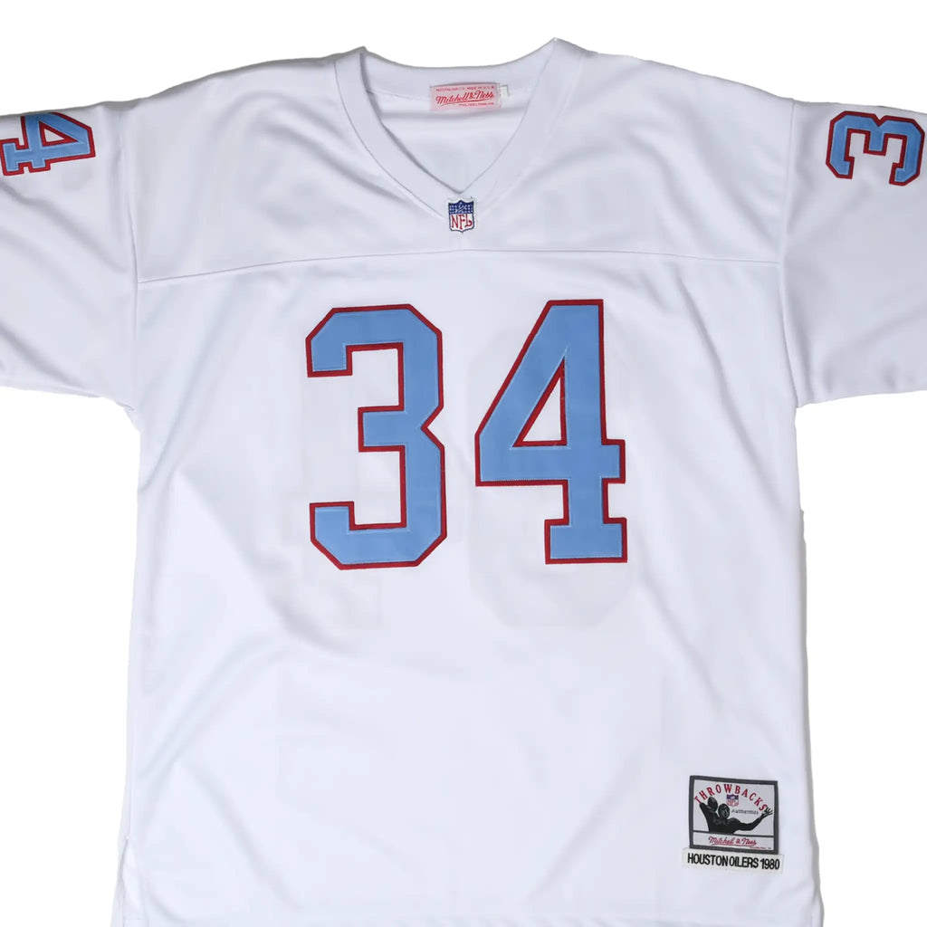 Front close-up of white Houston Oilers Earl Campbell #34 Mitchell & Ness jersey