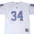 Front close-up of white Houston Oilers Earl Campbell #34 Mitchell & Ness jersey