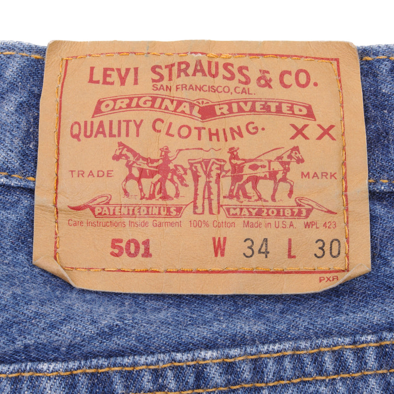 Beautiful Indigo Levis 501 Jeans 1980s Made in USA with Medium Wash   Size on tag 34X30 Actual Size 32X26  Back Button #511 Not Original Hem