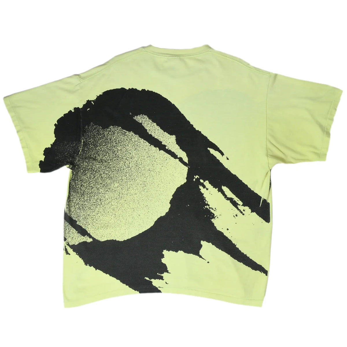 Back of neon yellow Nike tennis T-shirt with oversized black racket and ball print