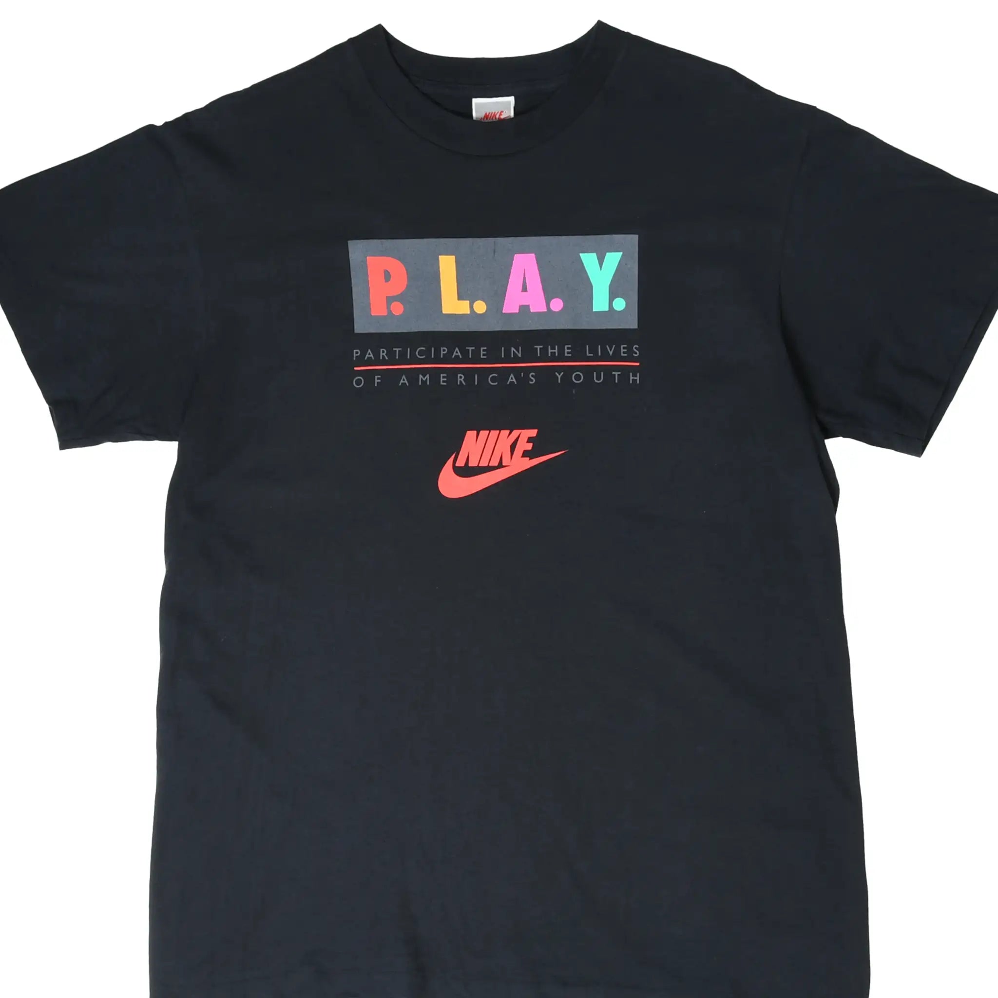 Front of black Nike P.L.A.Y. T-shirt with multicolor lettering and red Nike logo