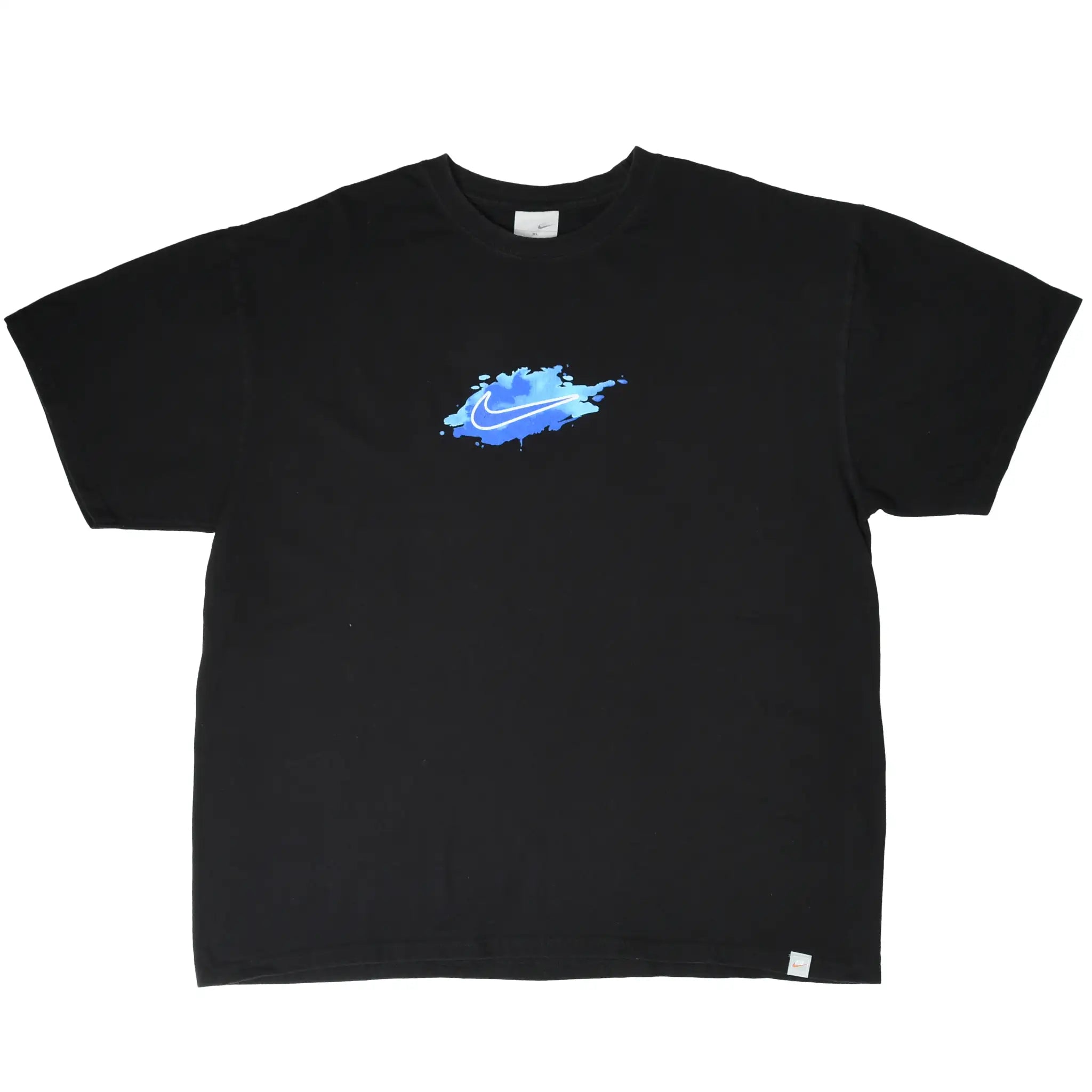 Full front of black Nike T-shirt with blue paint splash and white Swoosh graphic