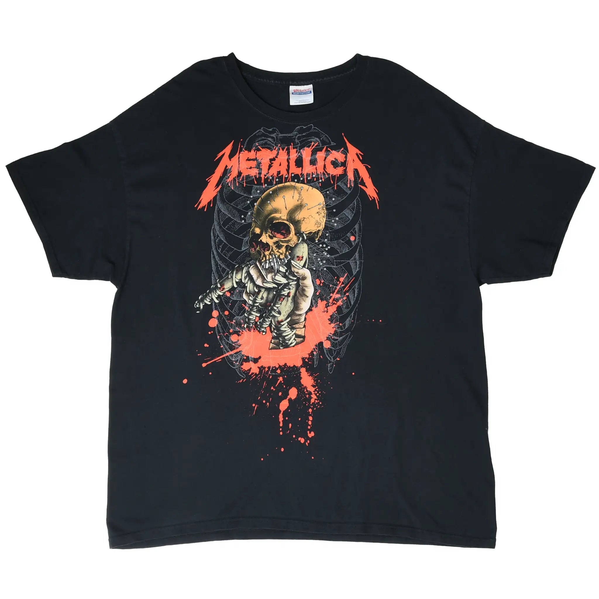 Full front view of black Metallica T-shirt with skull, skeleton, rib cage, and red splatter print