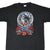 Front of black Lynyrd Skynyrd 25th anniversary T-shirt with red, white, and blue 1973–1998 graphic