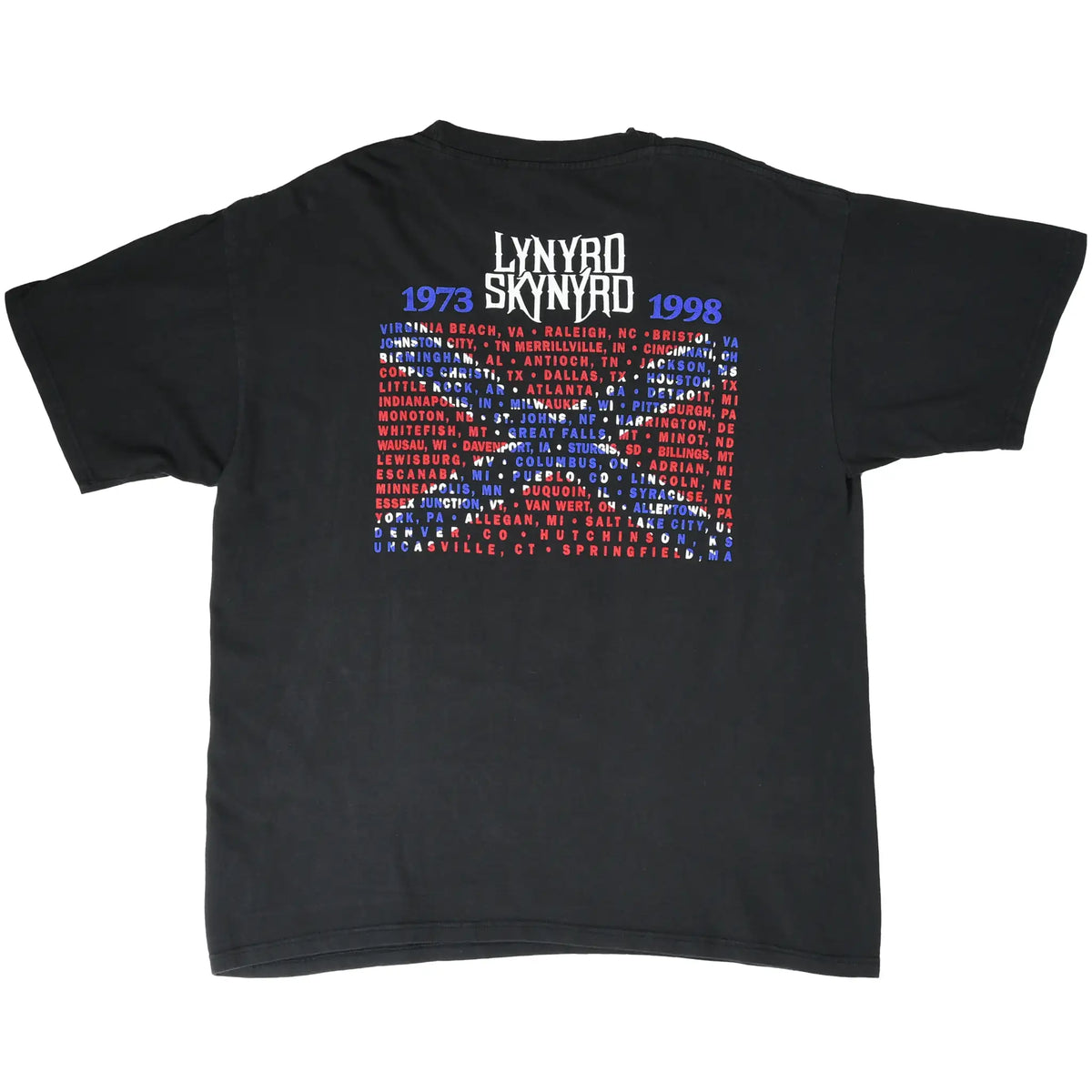 Back of black Lynyrd Skynyrd T-shirt with 1973–1998 text and red, white, and blue city list